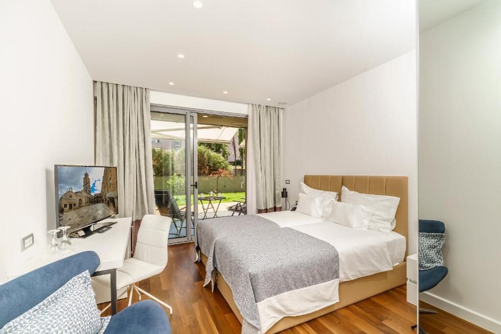 Guest room at Rooms Oasis Life
